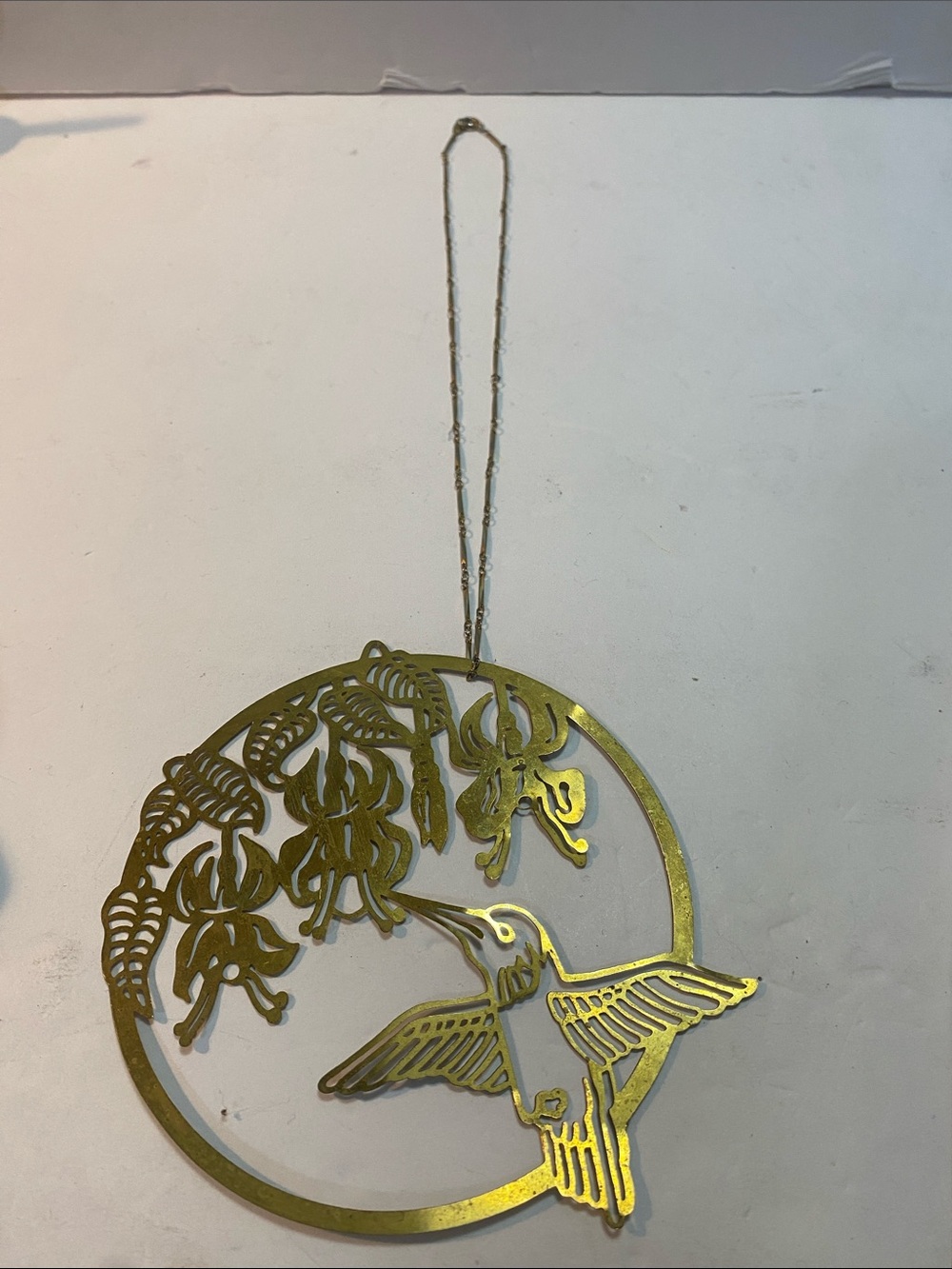 Brass humming bird decor